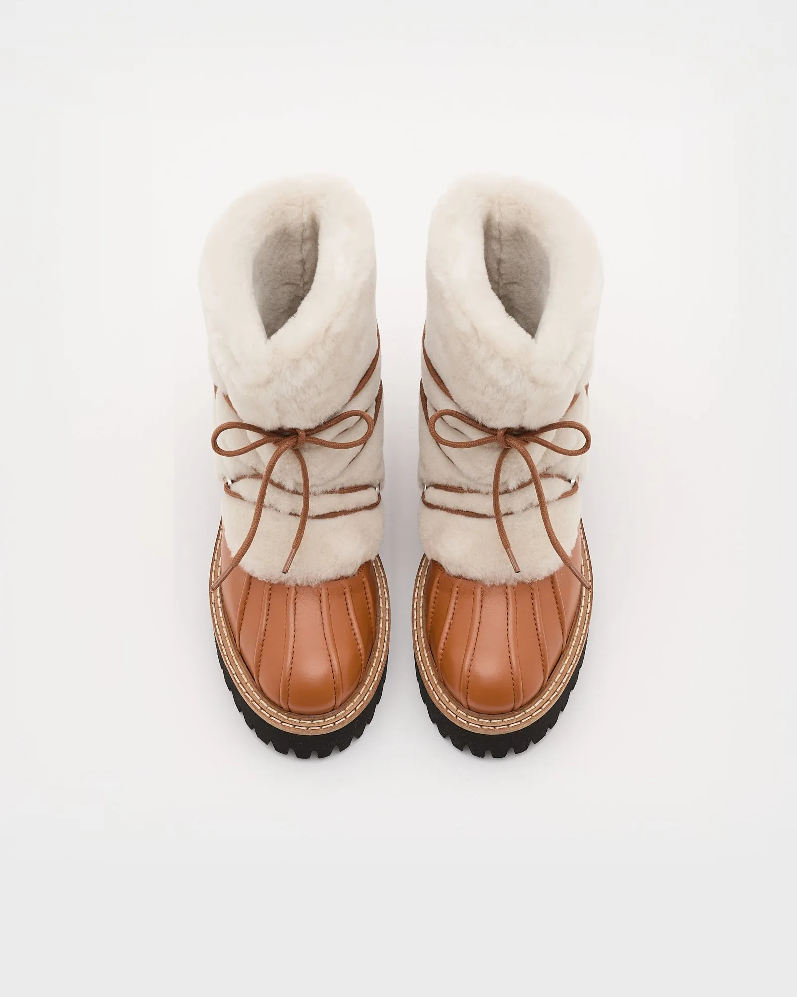 Lace-up mid-length boots in ironed Merino